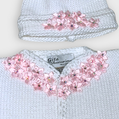 White cotton cardigan & hat with pink satin flowers