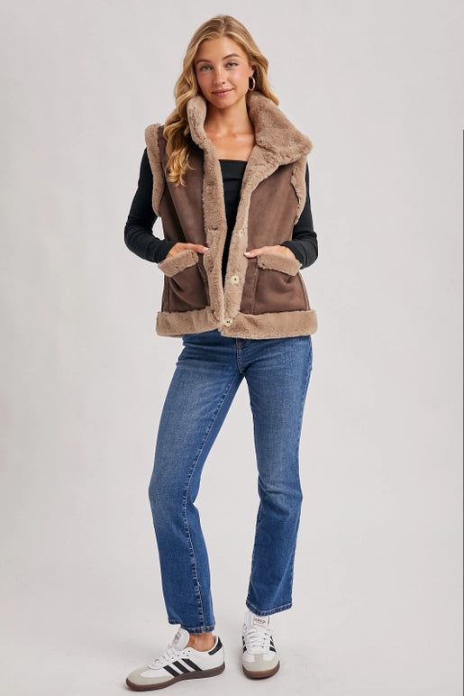 faux suede shearling vest, women’s winter layering vest, boutique cozy faux fur vest, shearling trim suede vest women, chic brown faux suede vest, rustic fall layering vest, boutique winter outfit topper, faux shearling lined vest, casual chic fall vest, boutique women’s outerwear vest