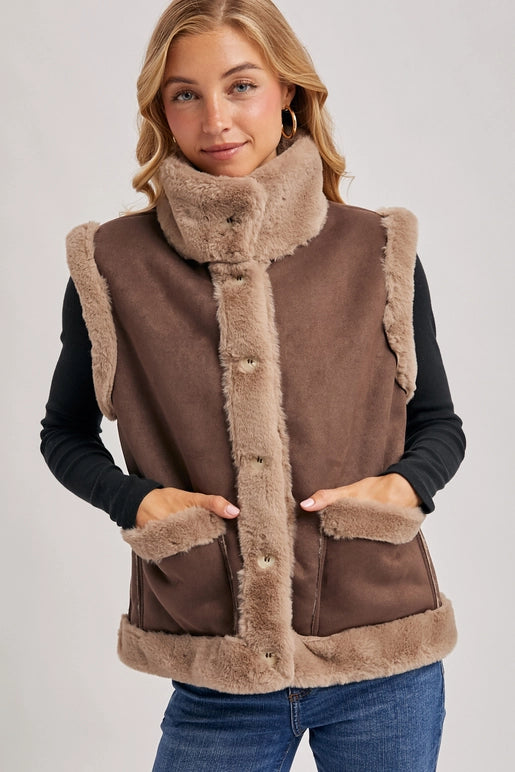 faux suede shearling vest, women’s winter layering vest, boutique cozy faux fur vest, shearling trim suede vest women, chic brown faux suede vest, rustic fall layering vest, boutique winter outfit topper, faux shearling lined vest, casual chic fall vest, boutique women’s outerwear vest