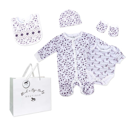 purple floral baby gift set, 5 piece newborn essentials set, boutique baby shower gift girl, floral print baby clothing set, unisex floral baby bundle, infant layette gift set boutique, cotton floral newborn set, purple baby outfit bundle, baby girl floral take home outfit, boutique floral gift pack