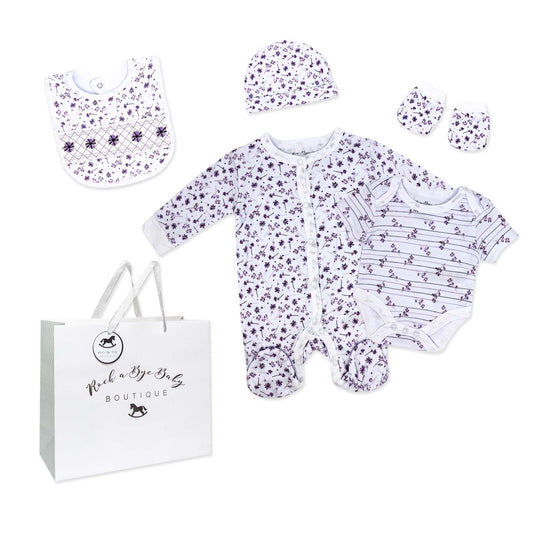 purple floral baby gift set, 5 piece newborn essentials set, boutique baby shower gift girl, floral print baby clothing set, unisex floral baby bundle, infant layette gift set boutique, cotton floral newborn set, purple baby outfit bundle, baby girl floral take home outfit, boutique floral gift pack
