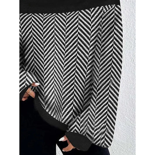 black high neck sweater, chevron stripe sweater, oversized knit sweater women, boutique black stripe sweater, split hem pullover sweater, chic winter sweater top, casual elegant knitwear, trendy high neck knit, black and white statement sweater, cozy fall winter sweater