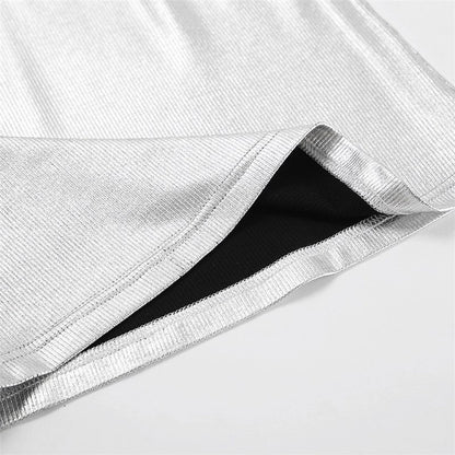 silver ribbed tank top Expressions Boutique NY, metallic knit camisole women, minimalist silver top, boutique sleeveless top metallic sheen, fitted rib knit cami