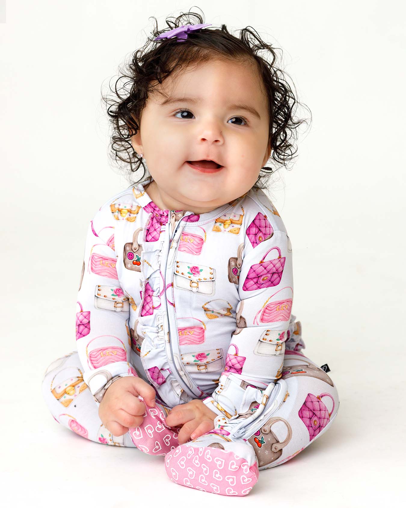 boutique baby bamboo footie Expressions Boutique NY, castle print ruffled zip baby sleeper, lavender floral baby onesie, soft bamboo footed pajamas, baby girl zippered sleeper breathable fabric