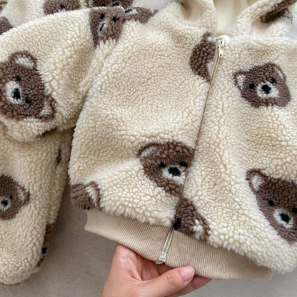bear plush coat baby, toddler teddy bear jacket, sherpa fleece kids coat, baby bear ear hoodie, plush winter coat for toddlers, boutique bear zip-up jacket, cozy baby outerwear, teddy print kids coat, infant fleece bear hoodie, warm toddler plush jacket
