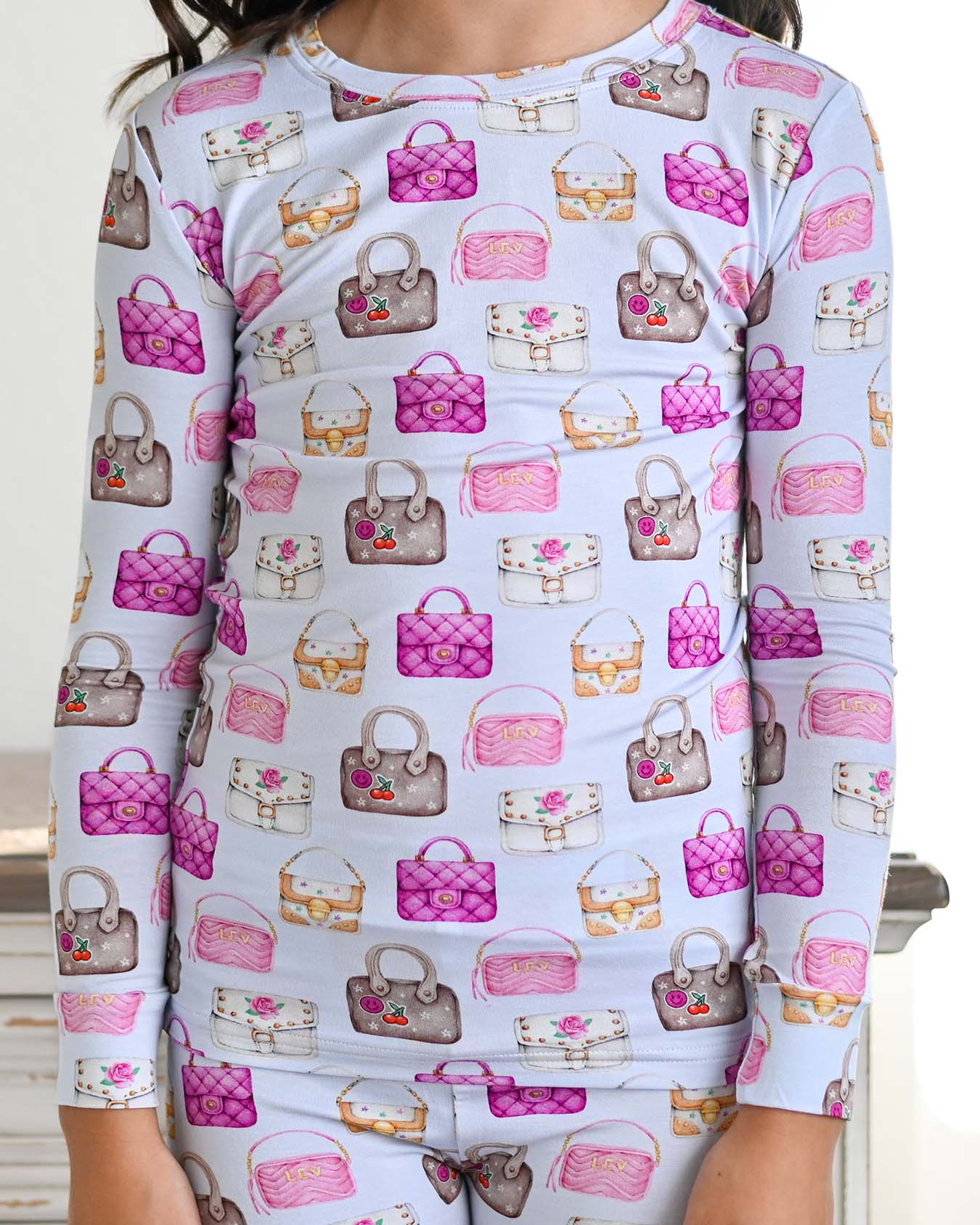boutique girls lounge set Expressions Boutique NY, handbag print toddler pajama set, cute kids loungewear outfit, soft stretchy two-piece lounge set, girls pastel pajama outfit breathable