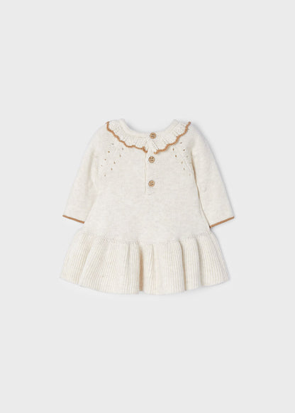 boutique baby girl sweater dress, cream knit baby dress Expressions Boutique NY, tan trim toddler girl dress, heirloom knit baby dress cream, holiday baby girl sweater dress, boutique toddler fashion neutral tones, cozy fall winter baby dress, special occasion knitwear for girls, soft cotton knit baby dress