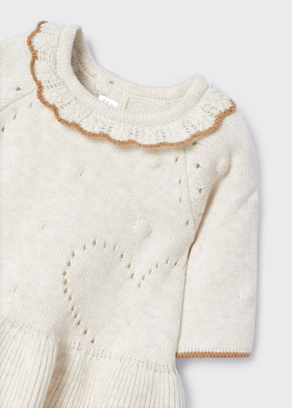 boutique baby girl sweater dress, cream knit baby dress Expressions Boutique NY, tan trim toddler girl dress, heirloom knit baby dress cream, holiday baby girl sweater dress, boutique toddler fashion neutral tones, cozy fall winter baby dress, special occasion knitwear for girls, soft cotton knit baby dress